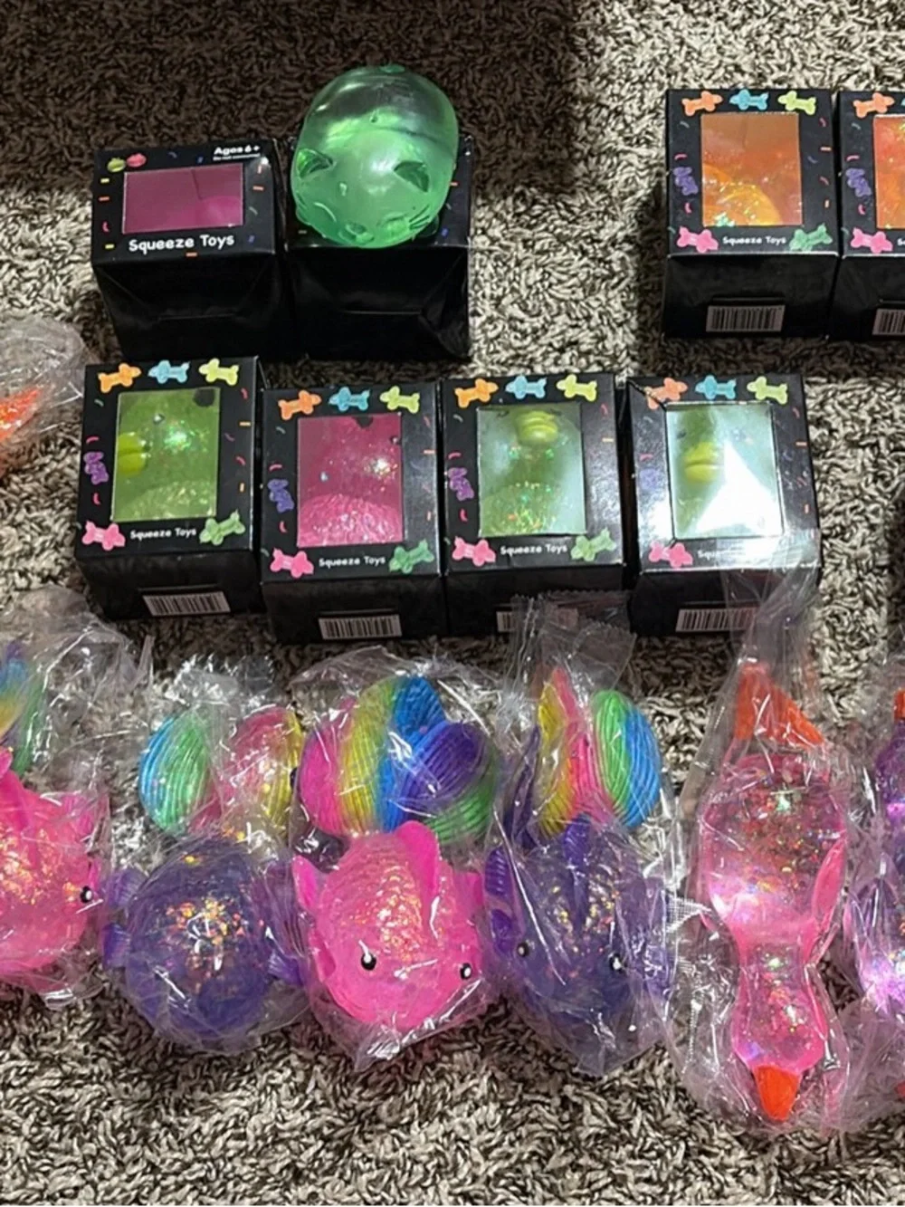 Assorted Rainbow Squeeze Toys - Pink, Purple, Green, Blue